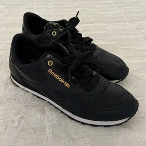 Reebok black and gold sneakers